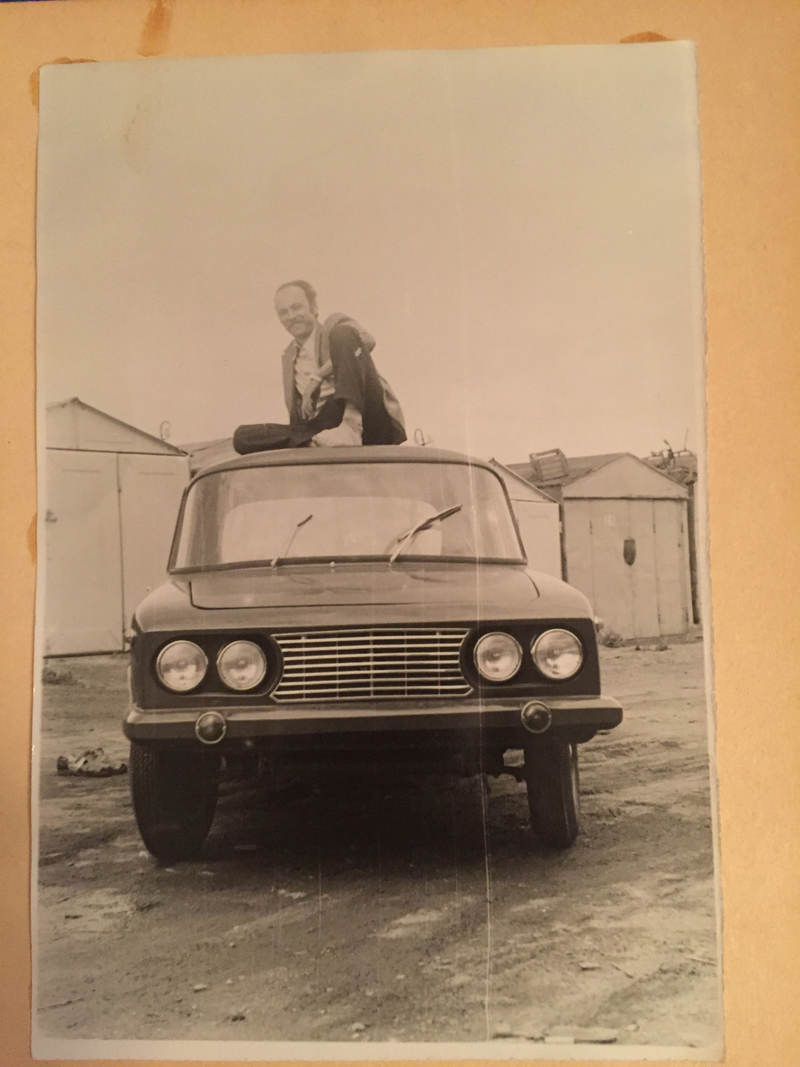 Alexander Petrovych copping-a-squat on one of his very sturdy cars. Yura contends that every Soviet homemade car builder has a picture like this.